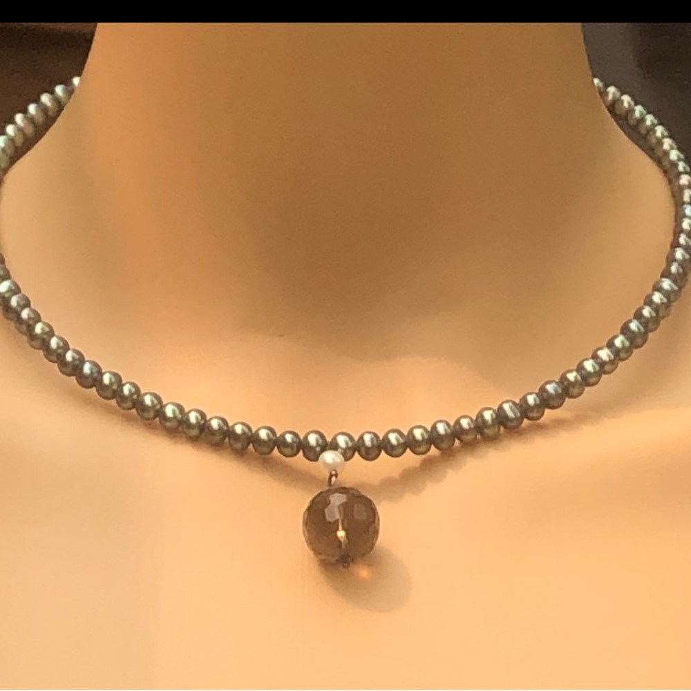 L30: choker style 5+ mm silver pearls on memory wire with lg smoky topaz dangle
